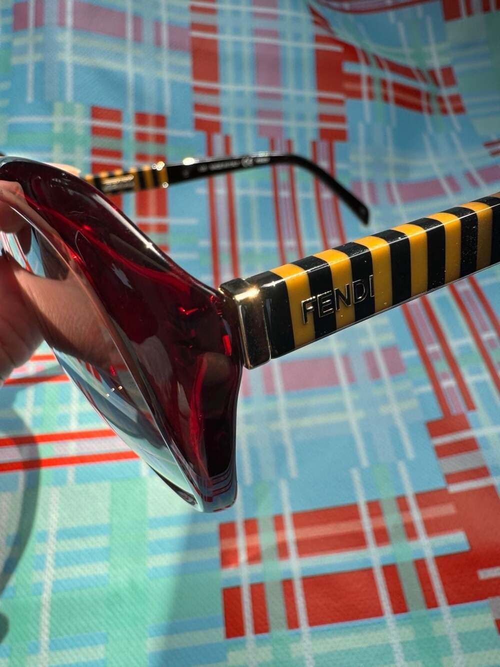 Fendi FS5348 604 Red Frame Black Yellow Stripe Temples Butterfly Sunglasses